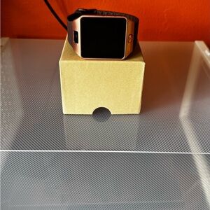 Rose Gold Smartwatch with Burgundy Silicone Strap